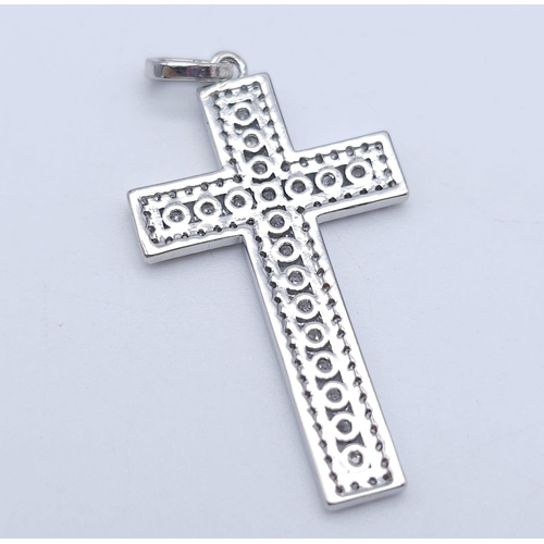 1525 - Two Bright Stone Zirconia Cross Pendants - Blue and White Stones. Largest cross - 4cm x 2cm