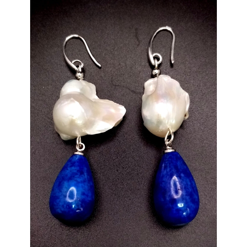 1546 - Pair of Baroque Pearl and Lapis Lazuli Earrings.
Measures 6cm in length.