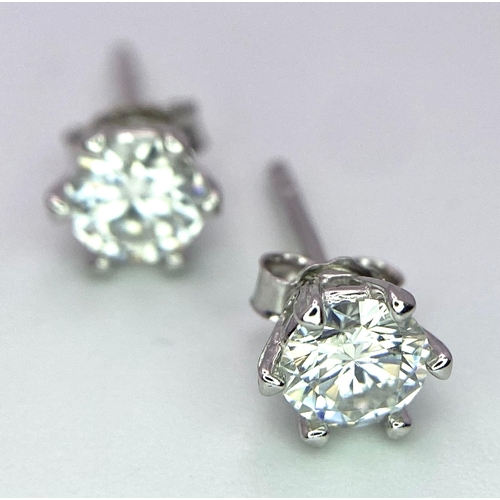 1343 - A Pair of Sterling Silver Moissanite Stud Earrings. 0.5ctw, 0.9g total weight.