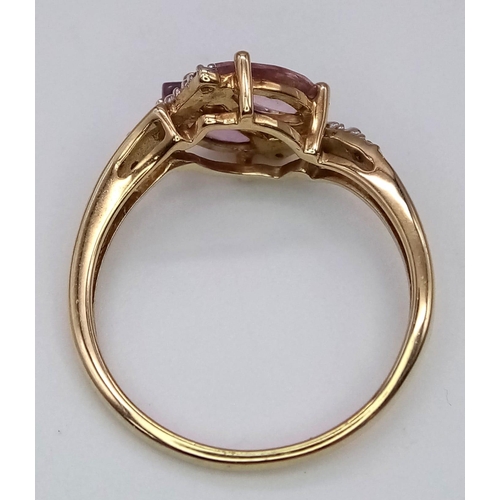 1574 - A 10k Yellow Gold, Amethyst and Diamond Crossover Ring. Size N. 2.17g total weight.