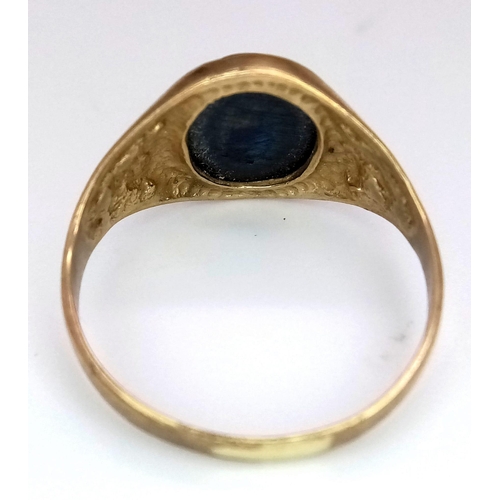 1139 - A Vintage 9K Yellow Gold Carved Grey Onyx Signet Ring. Size O. 2.55g total weight.