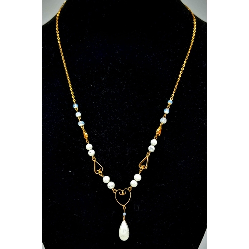 1630 - A Vintage Possibly Antique 9K Yellow Gold and Pearl Lavaliere Necklace. 4.7g total weight.