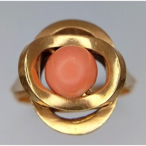 1651 - A Vintage 9K Yellow Gold (tested) Orbital Pink Coral Ring. Size Q/R. 4.6g total weight.