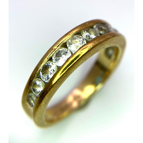 1366 - A 9K Yellow Gold and White Stone Half-Eternity Ring. Size N. 3.68g total weight.