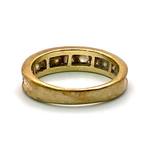 1366 - A 9K Yellow Gold and White Stone Half-Eternity Ring. Size N. 3.68g total weight.