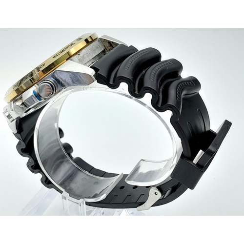 1380 - A Futuristic Casio Chronometer Gents Watch. Black rubber strap. Two tone stainless steel case - 46mm... 