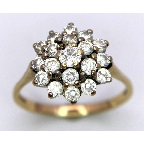 1387 - A 9K Yellow Gold CZ Floral Cluster Ring. Size P. 2.68g total weight.