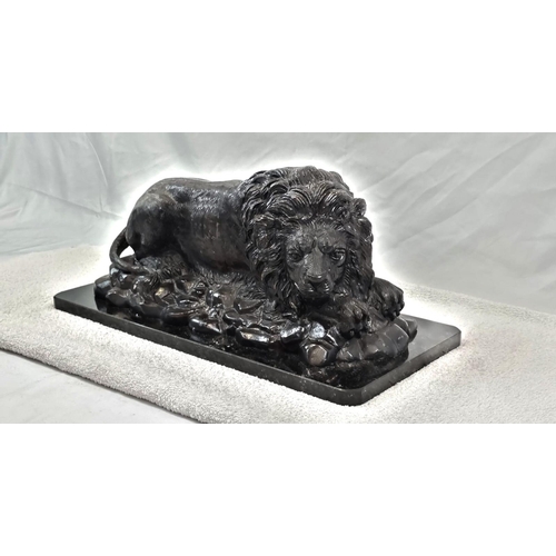 1619 - A Vintage, Possibly Antique Bronze Sculpture of a Resting Lion. Black patinated finish. Black marble... 