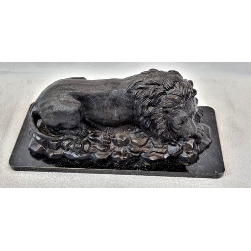 1619 - A Vintage, Possibly Antique Bronze Sculpture of a Resting Lion. Black patinated finish. Black marble... 