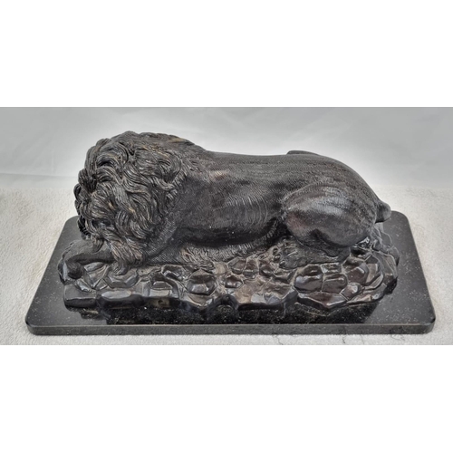 1619 - A Vintage, Possibly Antique Bronze Sculpture of a Resting Lion. Black patinated finish. Black marble... 