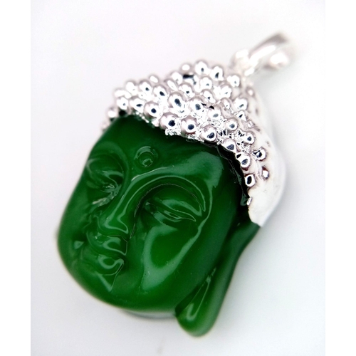 1730 - Jadeite Buddha Pendant/Charm.
Measures 4cm by 2.5cm.