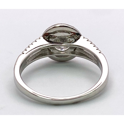 1499 - A Sterling Silver Moissanite Ring. Size P, 1ctw, 2.8g total weight.