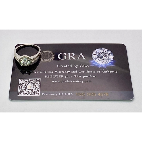 1499 - A Sterling Silver Moissanite Ring. Size P, 1ctw, 2.8g total weight.