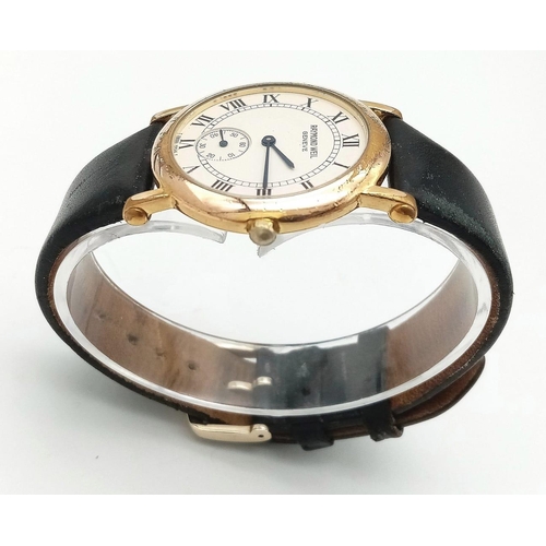 1527 - A Classic Raymond Weil Gents Dress Watch. Black leather strap. Gold plated case - 33mm. White dial w... 