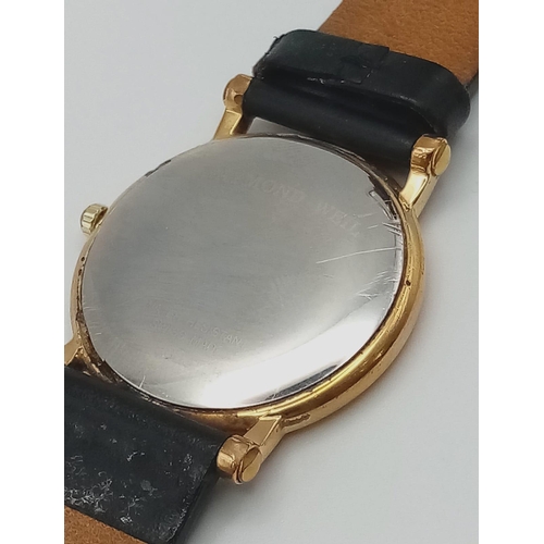 1527 - A Classic Raymond Weil Gents Dress Watch. Black leather strap. Gold plated case - 33mm. White dial w... 