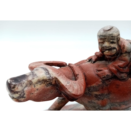 1312 - A wonderful Hardstone Chinese Antique Figure on a wooden base. Lovely red, grey and white colours in... 