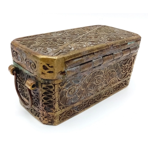 1739 - An Antique Bronze Indian Spice Chest.
Beautiful intricate scroll design. Under the lid, 4 compartmen... 