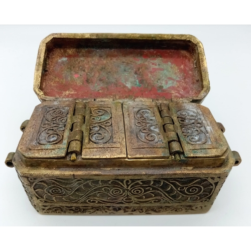 1739 - An Antique Bronze Indian Spice Chest.
Beautiful intricate scroll design. Under the lid, 4 compartmen... 