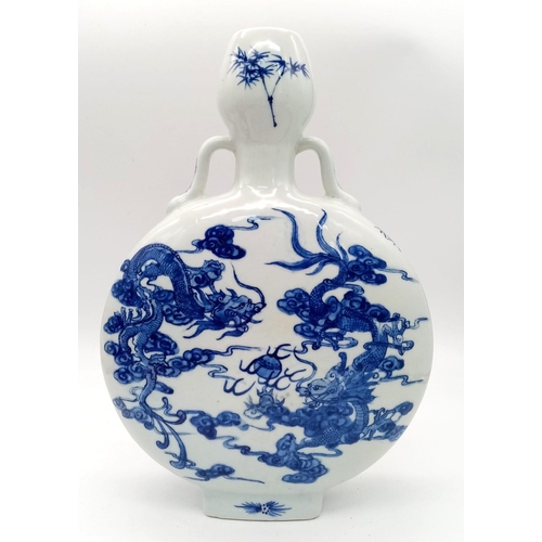 1718 - An Antique (Early 20th century) Chinese Blue and White Ceramic Moon Flask. Wonderful Dragon decorati... 