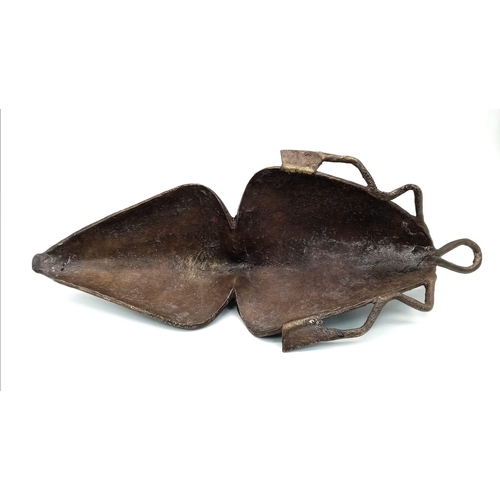 1753 - An Unusual Antique Bronze Tribal Oval Shaped African Mask. 
Serpent decoration at crown. 32cm x 14cm... 