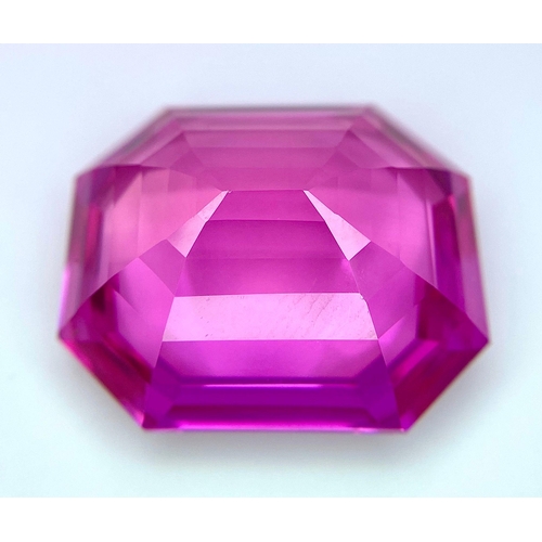 112 - An amazing, large (41,1 carats), emerald cut, pink RUBY with very interesting optical properties due... 