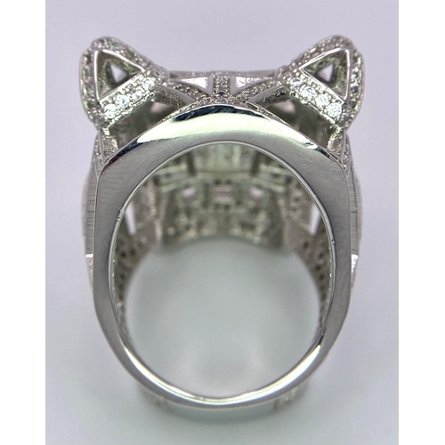 119 - A very impressive, silver PANTHER ring in the style of French designer with hundreds of cubic zircon... 