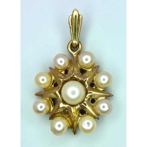 1748 - A Vintage 9K Yellow Gold Pearl Circle Pendant. 22mm. 1.9g total weight.