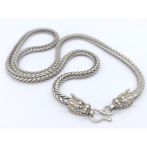 189 - A vintage, Chinese silver, double headed Dragon, chain necklace. Length: 60 cm, weight: 56 g.