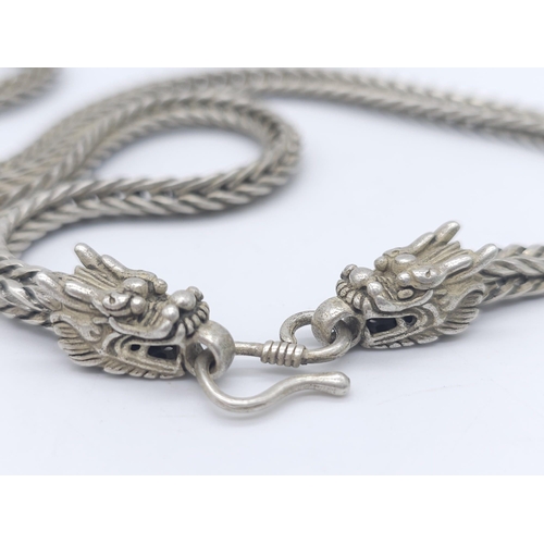 189 - A vintage, Chinese silver, double headed Dragon, chain necklace. Length: 60 cm, weight: 56 g.