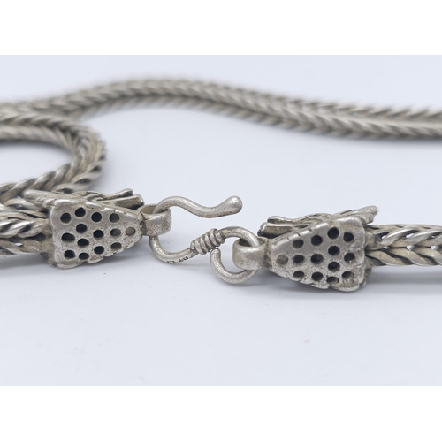 189 - A vintage, Chinese silver, double headed Dragon, chain necklace. Length: 60 cm, weight: 56 g.