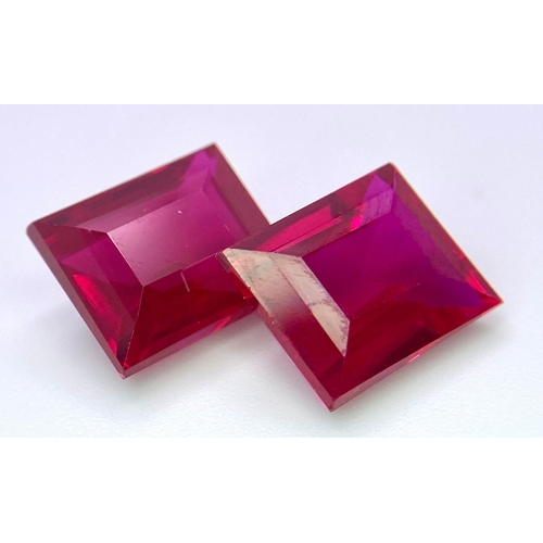 231 - A quality pair of pigeon blood red RUBIES. Emerald cut, immaculate and flawless, each stone is 9 car... 