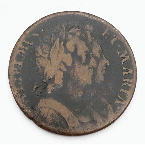 405 - A 1694 William and Mary Half Penny Coin. Please see photos for conditions.