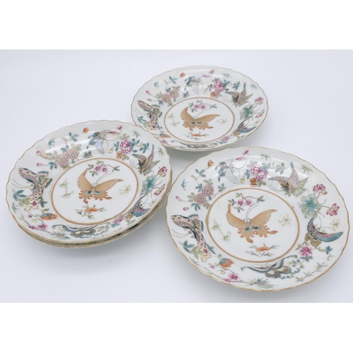 440 - A set of 4 Daoguang (1820-1850) Era Dishes.
Beautifully decorated with a iridescent floral & butterf... 