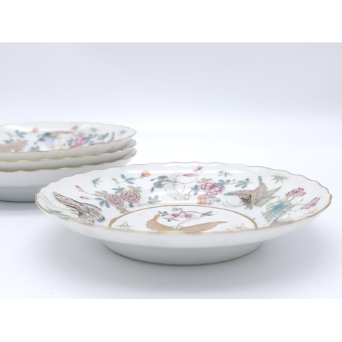 440 - A set of 4 Daoguang (1820-1850) Era Dishes.
Beautifully decorated with a iridescent floral & butterf... 