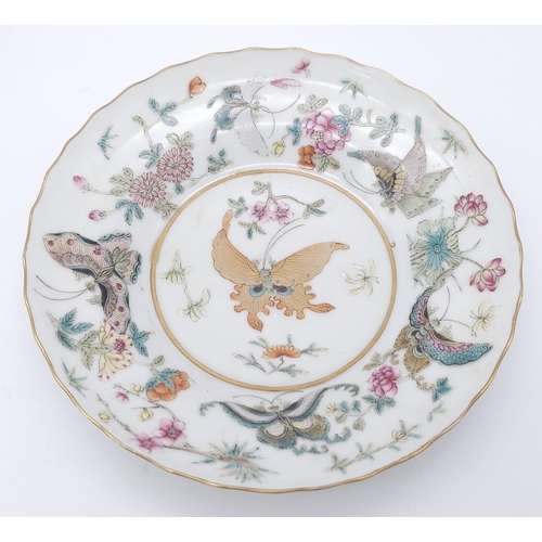 440 - A set of 4 Daoguang (1820-1850) Era Dishes.
Beautifully decorated with a iridescent floral & butterf... 