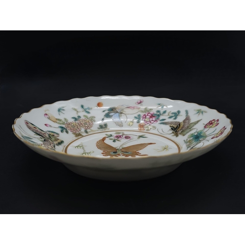 440 - A set of 4 Daoguang (1820-1850) Era Dishes.
Beautifully decorated with a iridescent floral & butterf... 