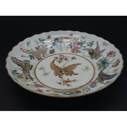 440 - A set of 4 Daoguang (1820-1850) Era Dishes.
Beautifully decorated with a iridescent floral & butterf... 