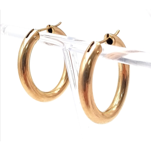 540 - A Pair of 9k Yellow Gold Elongated Hoop Earrings. 32mm drop. 6.50g total weight.