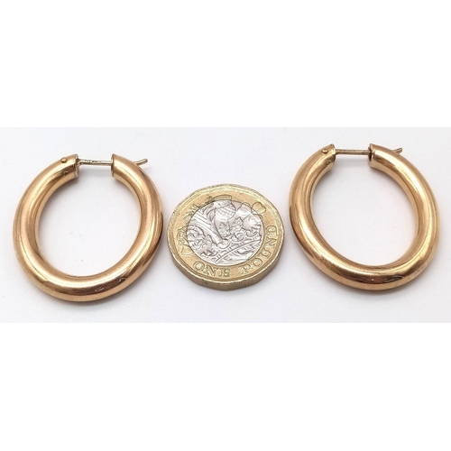 540 - A Pair of 9k Yellow Gold Elongated Hoop Earrings. 32mm drop. 6.50g total weight.