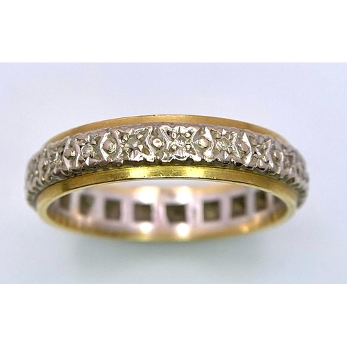 711 - A Vintage 18K Yellow and White Gold Diamond Eternity Ring. 
Size P. 5g total weight.