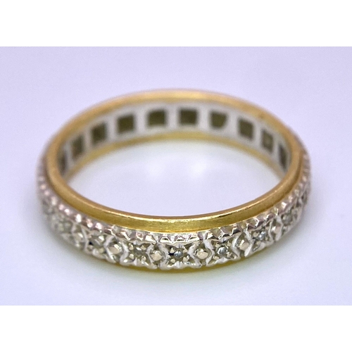 711 - A Vintage 18K Yellow and White Gold Diamond Eternity Ring. 
Size P. 5g total weight.