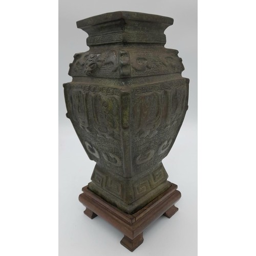 450 - A Beautiful Qing Dynasty Bronze vase. Wonderful archaic detail with a well-aged patina. Comes on a w... 