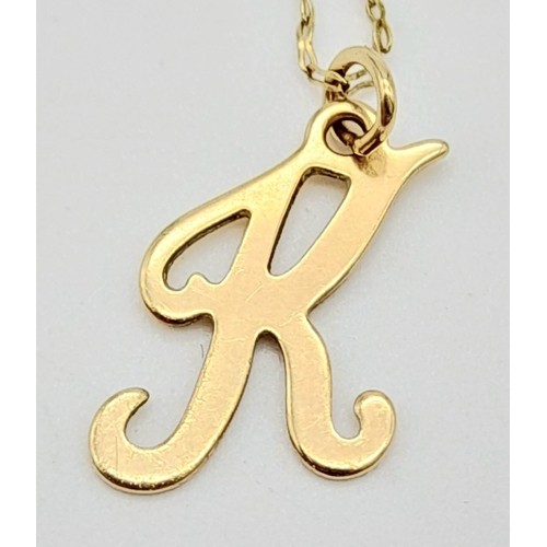 1696 - A 9K Gold K Pendant on a 9K Gold Disappearing Necklace. 15mm and 46cm. 0.8g