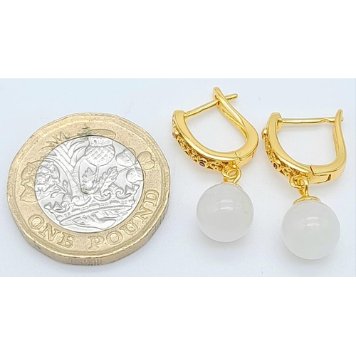 1729 - Pair of Gold Plated, Silver Jade Earrings.
Drop measures 2cm.
Weight: 4.04g