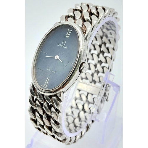 219 - A Classic Omega Deville 925 Silver Ladies Watch. Silver link bracelet and Oval case - 23mm. Black di... 