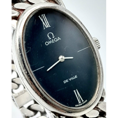 219 - A Classic Omega Deville 925 Silver Ladies Watch. Silver link bracelet and Oval case - 23mm. Black di... 