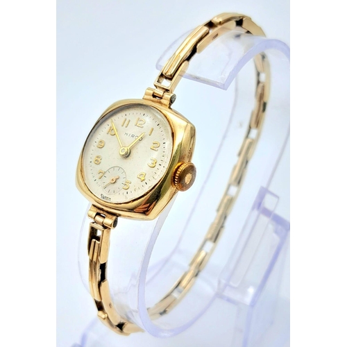 414 - A Vintage 9K Gold Hirco Ladies Watch. 9K gold expandable spring bracelet. 9k gold case - 21mm. White... 