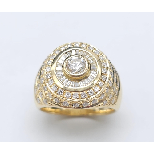 93 - An 18K Yellow Gold and Diamond Bullseye Dress Ring. A central brilliant round cut diamond surrounded... 