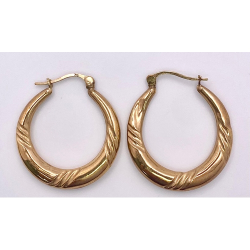 986 - A Pair of Vintage 9K Yellow Gold Hoop Earrings with Diagonal  Engraved Decoration. 1.76g total weigh... 