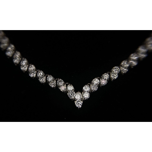 295 - A Breath-Taking 10ct Diamond and Platinum Necklace. Over 180 quality round cut diamonds in a wonderf... 